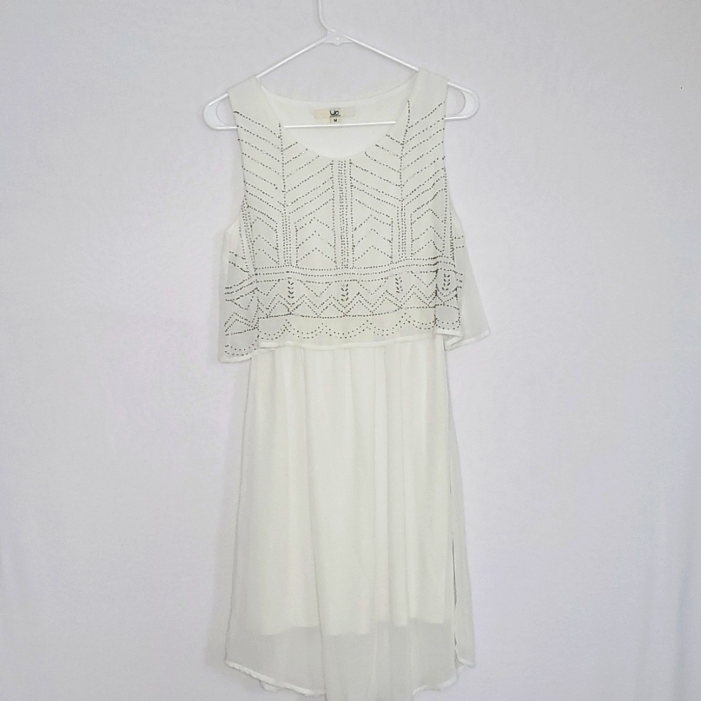 Sheer white dress with beaded detail